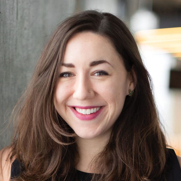 Emily Miller professional headshot, smiling to camera