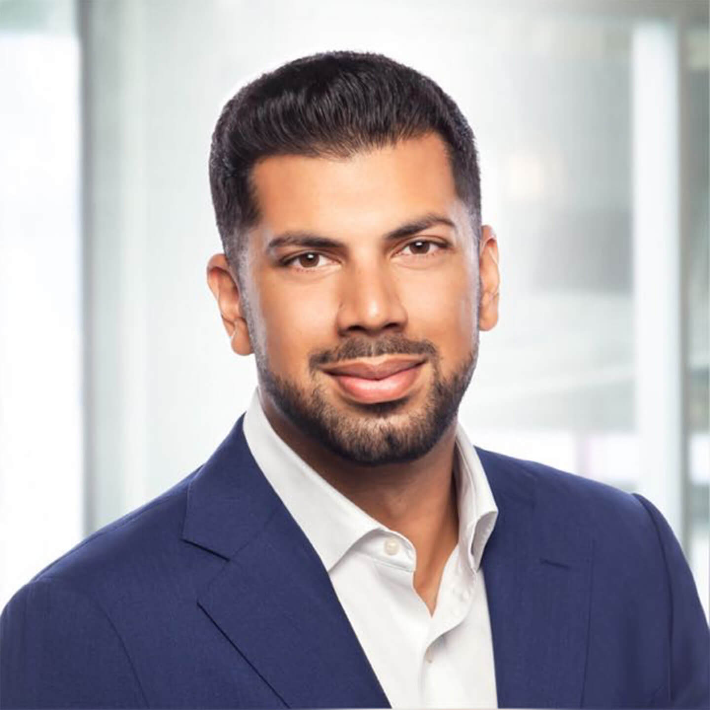 Christian Browne professional headshot, smiling to camera