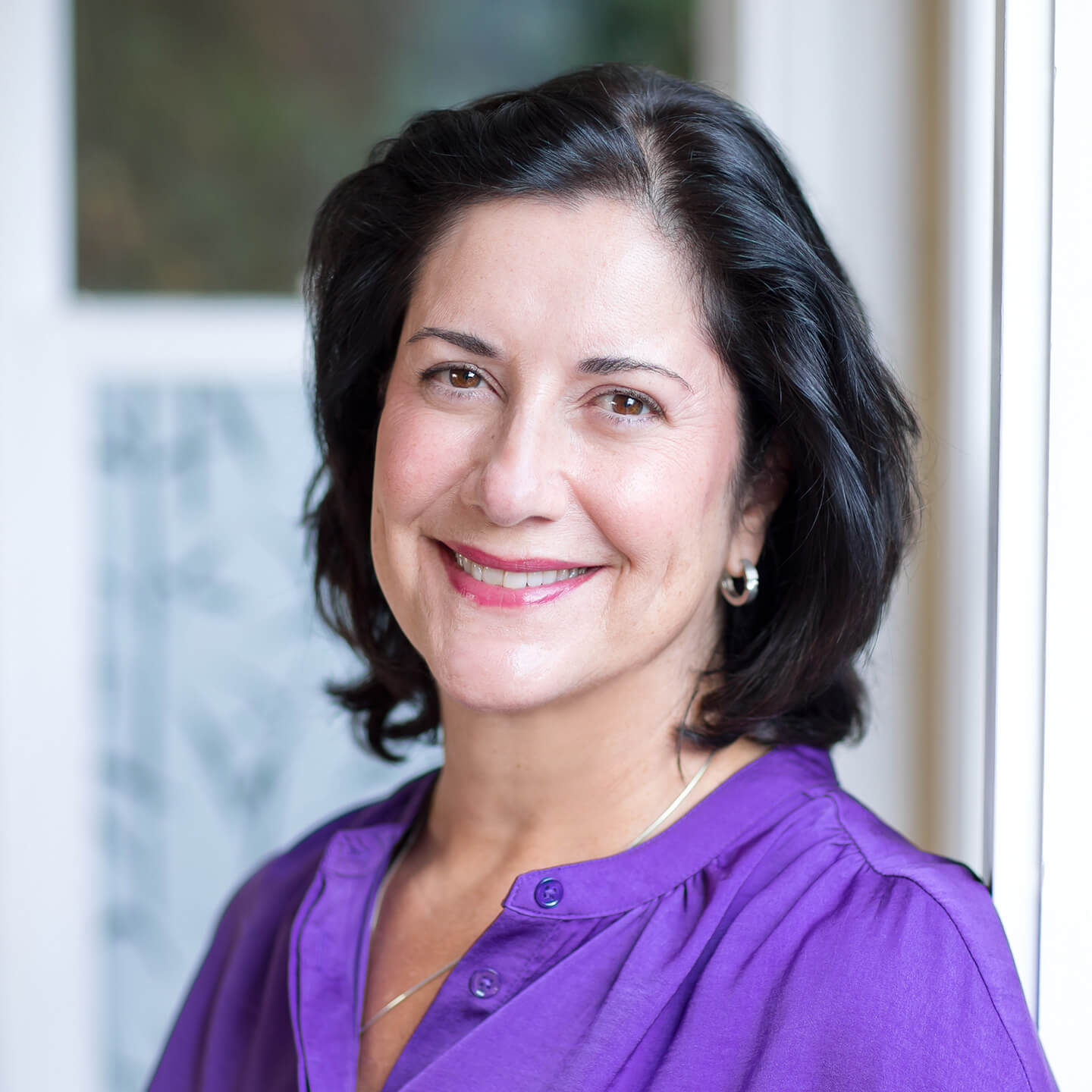 Sue Murtagh professional headshot, smiling to camera